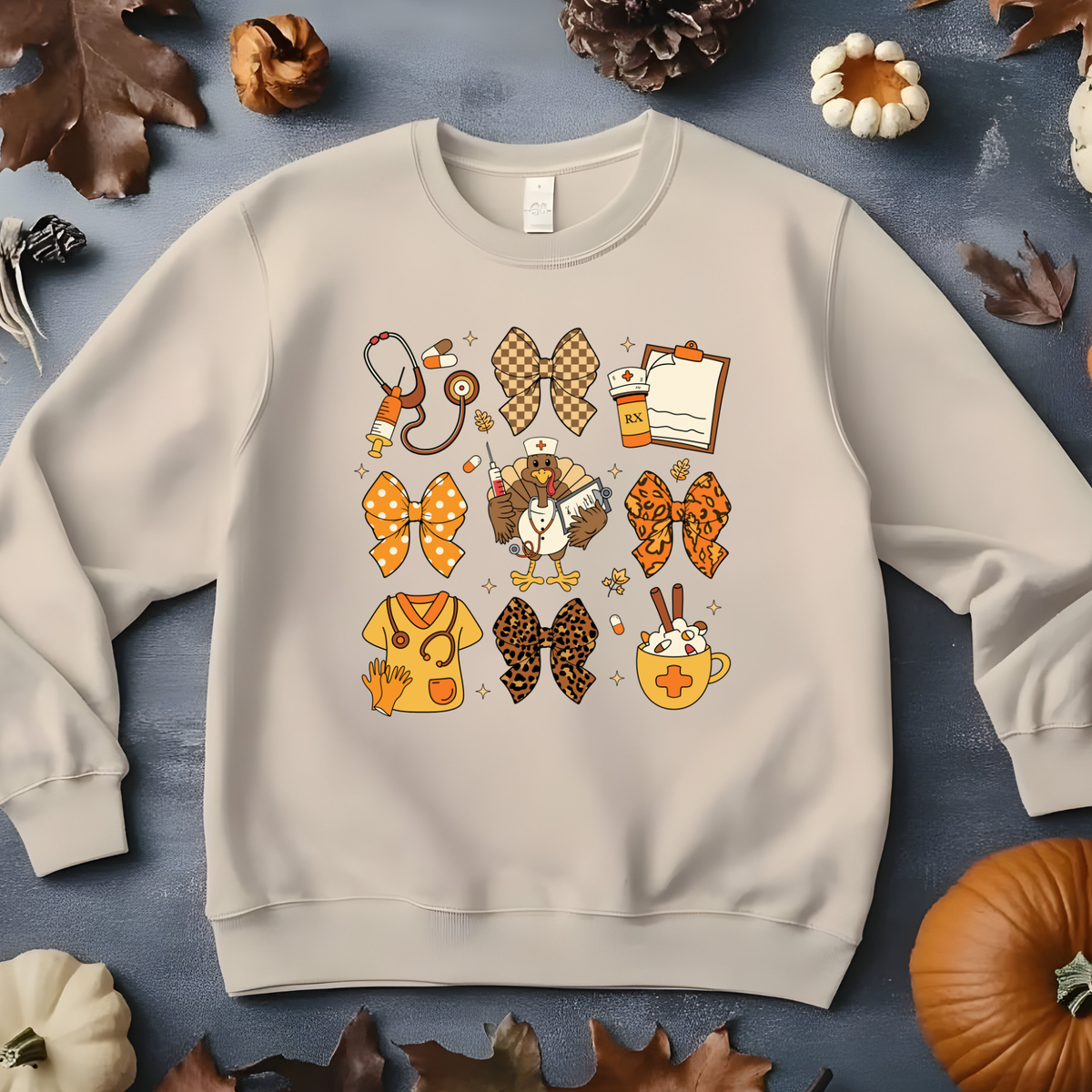 Thanksgiving nursing design featuring a turkey dressed as a nurse, stethoscope, syringe, prescription bottle, medical clipboard, scrubs, and decorative bows in orange, brown, and leopard print.