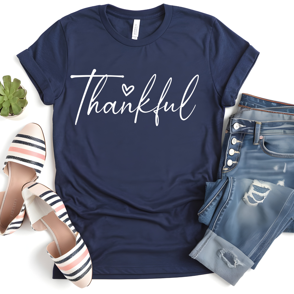 Elegant white Thankful script lettering in a minimalist handwritten style.