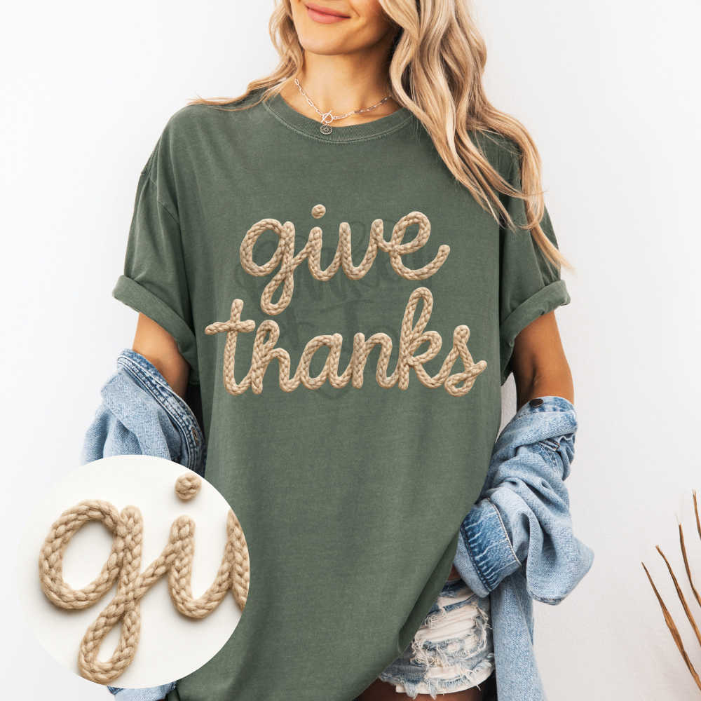 Simple give thanks lettering in a warm tan handwritten script.