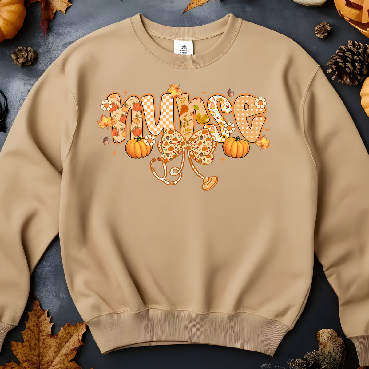 Retro orange NURSE lettering decorated with playful fall-themed accents.