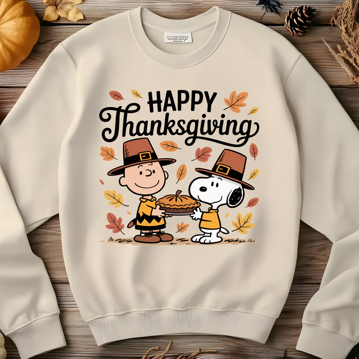 Cartoon-style Thanksgiving design featuring familiar comic strip characters with pumpkins and Happy Thanksgiving lettering.