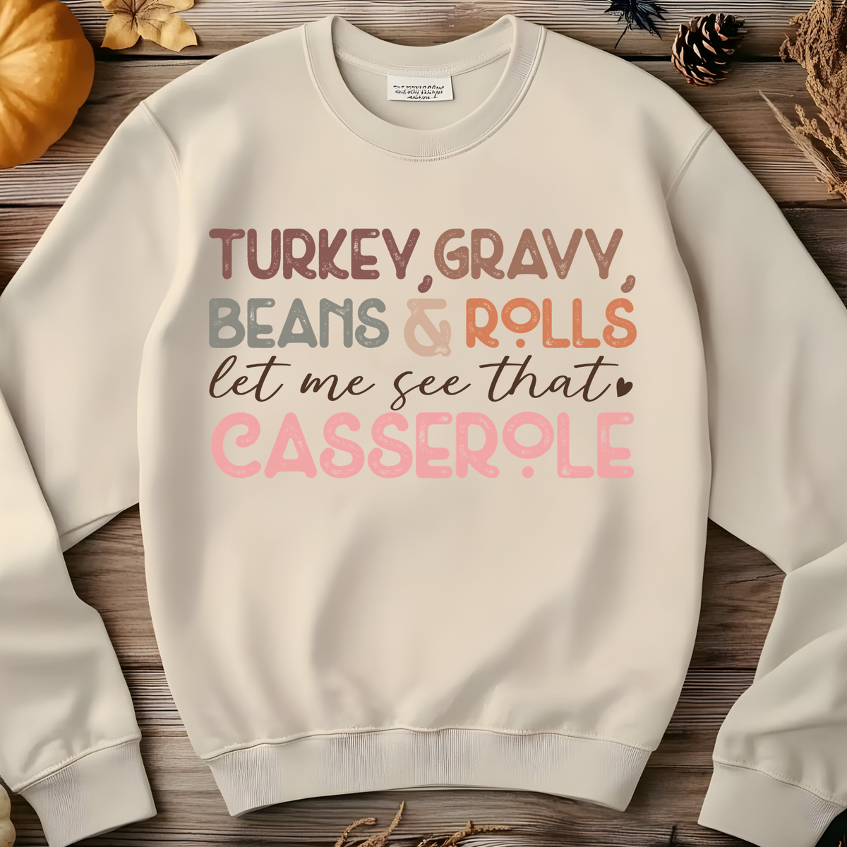Turkey Gravy Beans and Rolls Let Me See That Casserole phrase in playful pink and brown lettering.