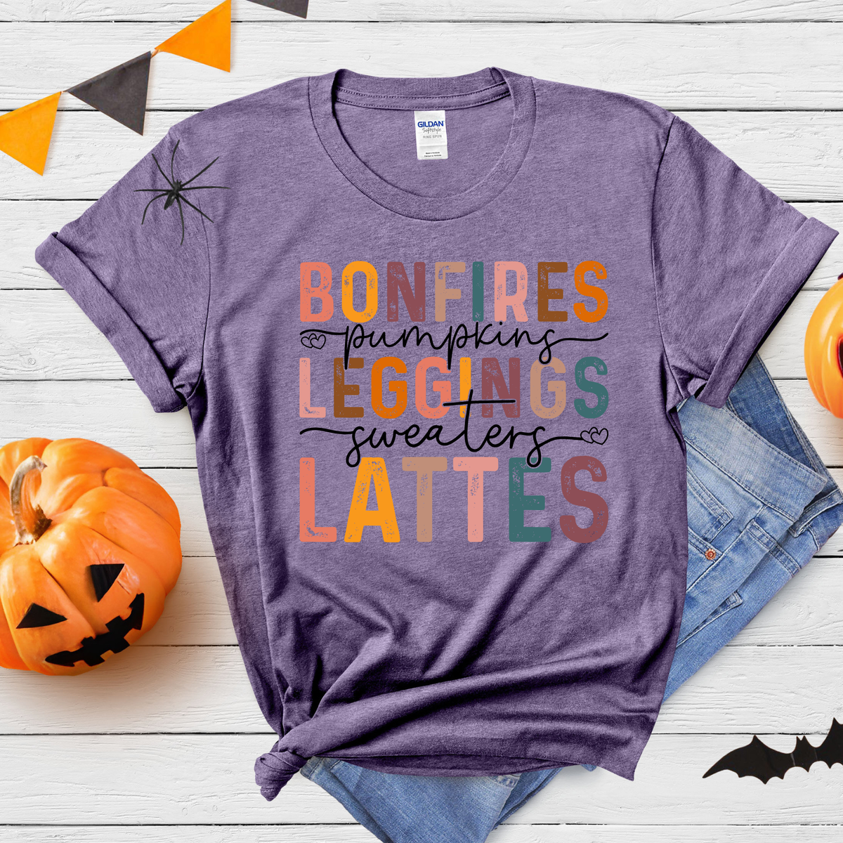Colorful fall typography featuring Bonfires, Hoodies, Leggings, Sweaters and Lattes in orange, pink and teal lettering.