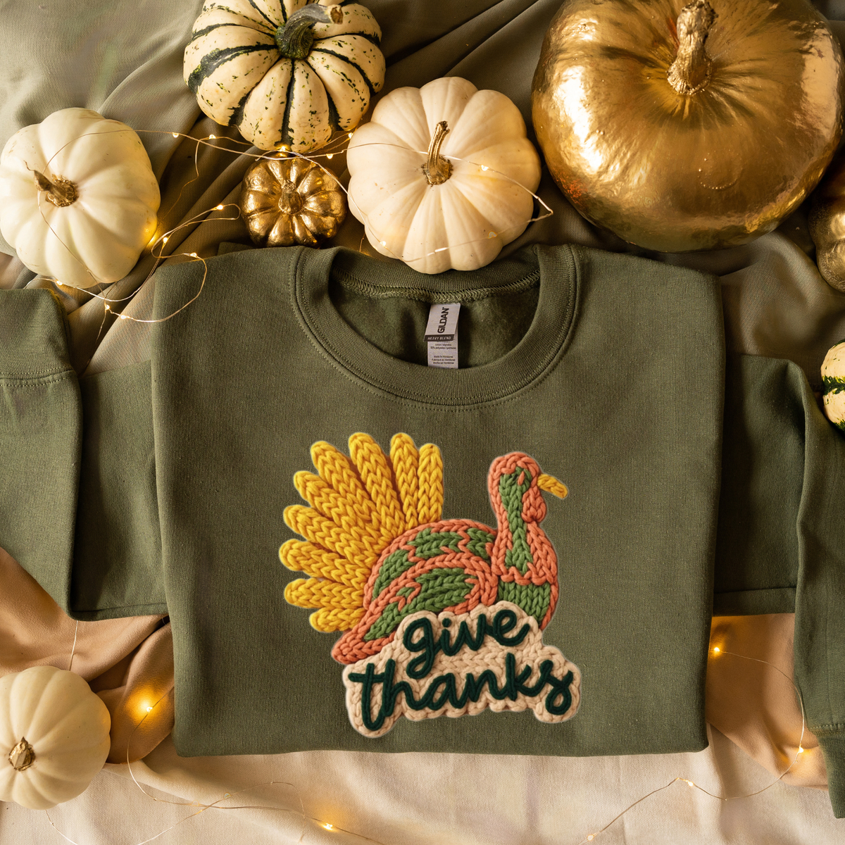 Rustic Thanksgiving turkey illustration in warm autumn colors with Give Thanks lettering.