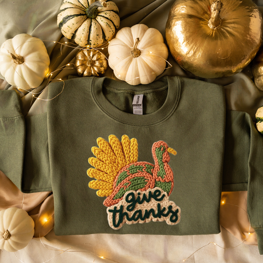 Rustic Thanksgiving turkey illustration in warm autumn colors with Give Thanks lettering.