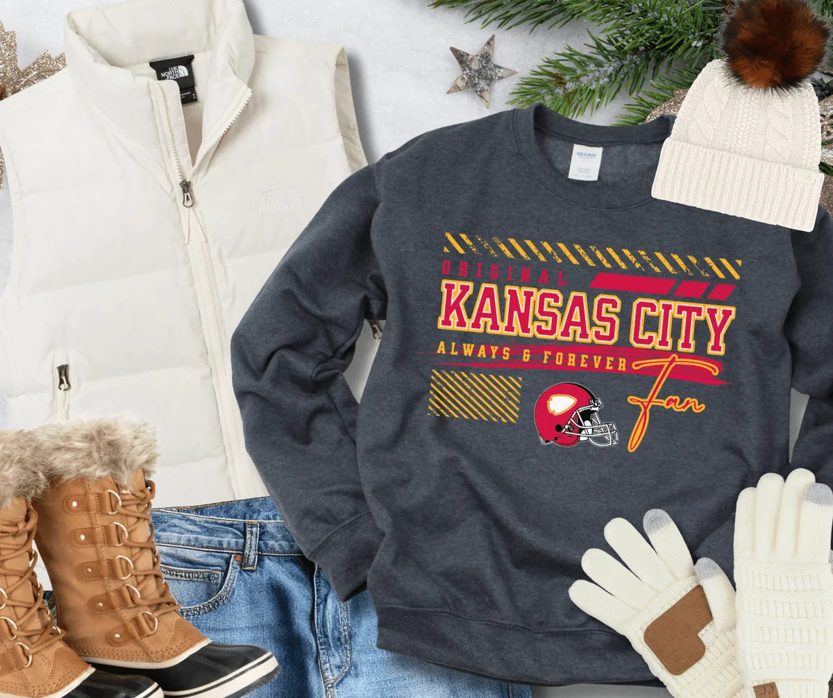 A dark heather gray crewneck sweatshirt with a 'Kansas City Always & Forever Fan' graphic